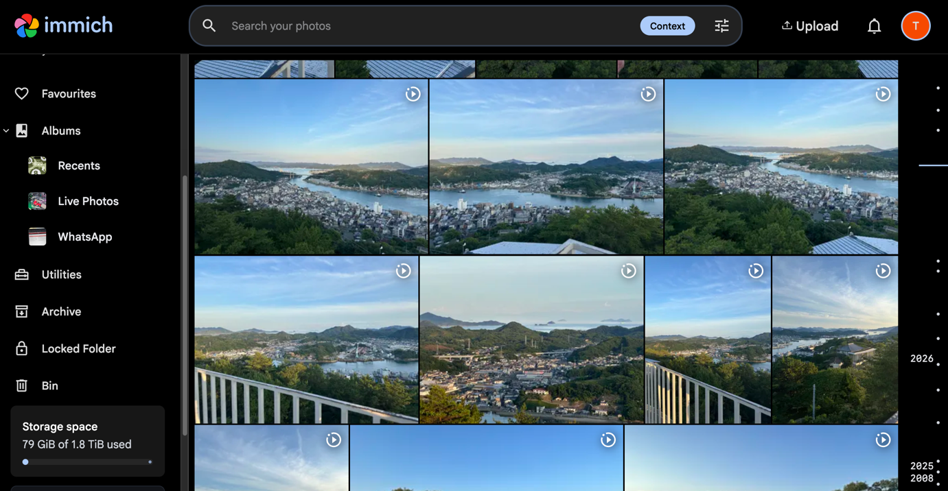 Immich web interface showing a photo library timeline